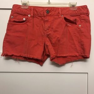 American Eagle peach cutoff shorts